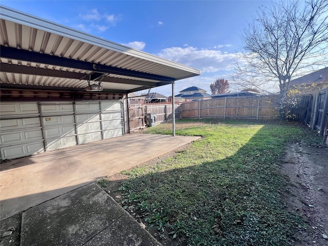 view of yard featuring a garage