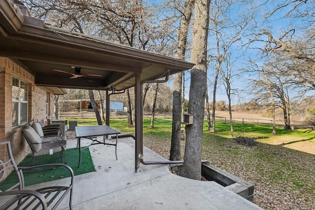 view of patio featuring ceiling fan