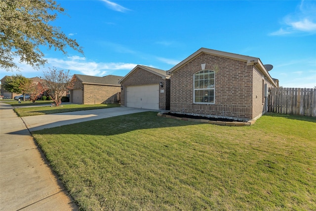 single story home featuring a garage and a front lawn