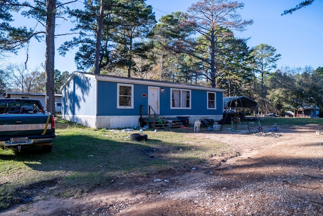 view of front of house with a carport