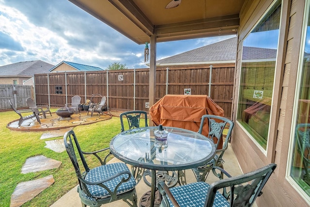 view of patio featuring a fire pit and area for grilling