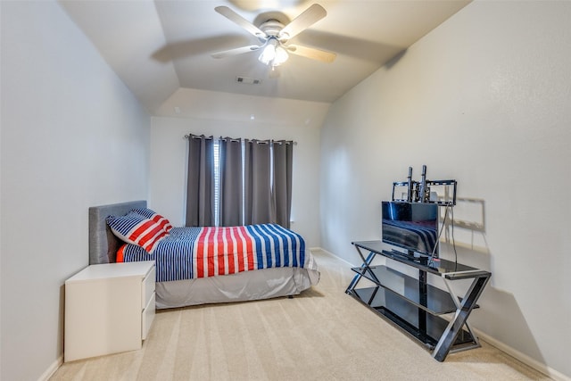 carpeted bedroom with ceiling fan and lofted ceiling