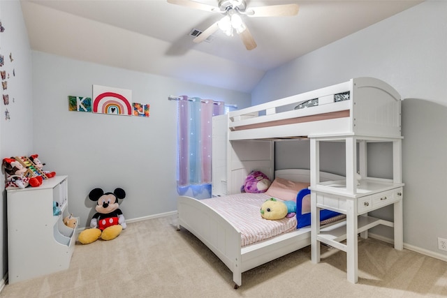 carpeted bedroom with ceiling fan and lofted ceiling