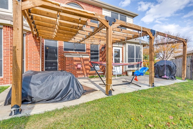 view of patio featuring a pergola and a grill