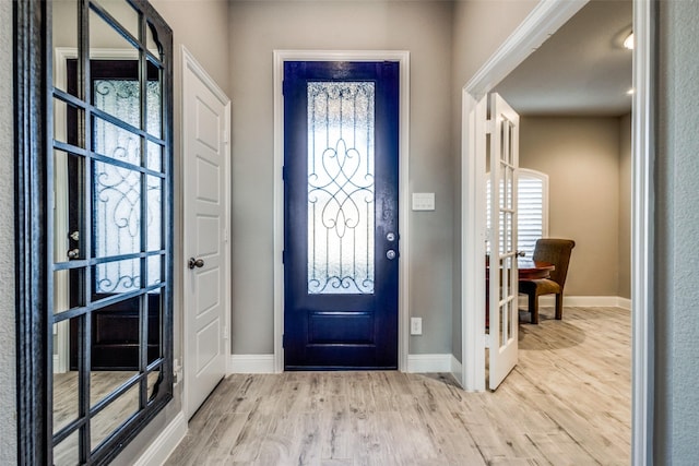 foyer featuring light hardwood / wood-style flooring