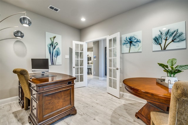 office featuring french doors and light wood-type flooring