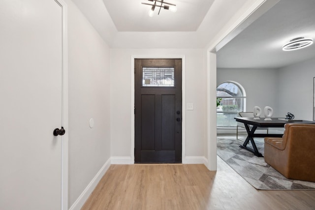 entryway with light hardwood / wood-style flooring