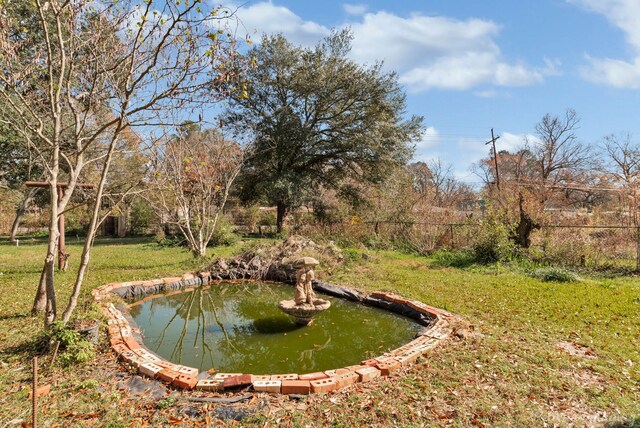 6263 Bain Blvd, Keithville, LA 71047 - view of yard with fence and a garden pond