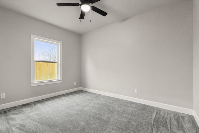 carpeted empty room with ceiling fan