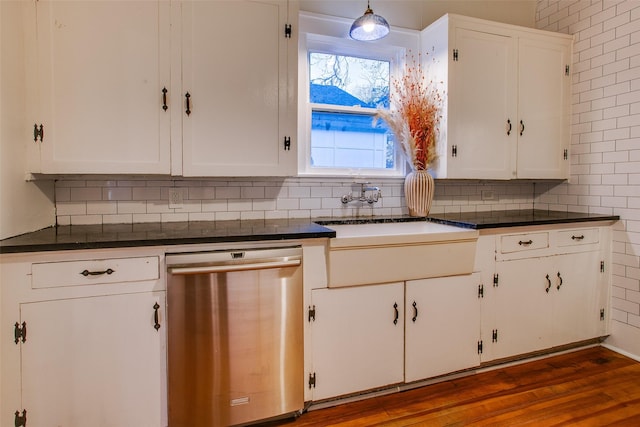 kitchen featuring dishwasher, wood-type flooring, white cabinets, and pendant lighting