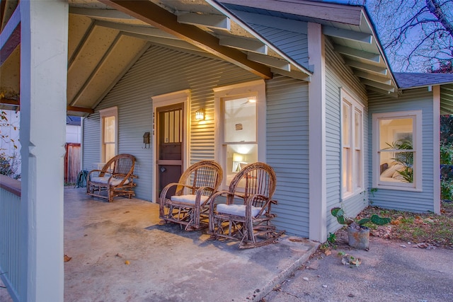 entrance to property featuring a porch