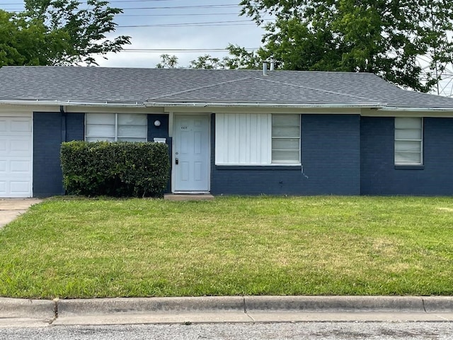 single story home featuring a front yard