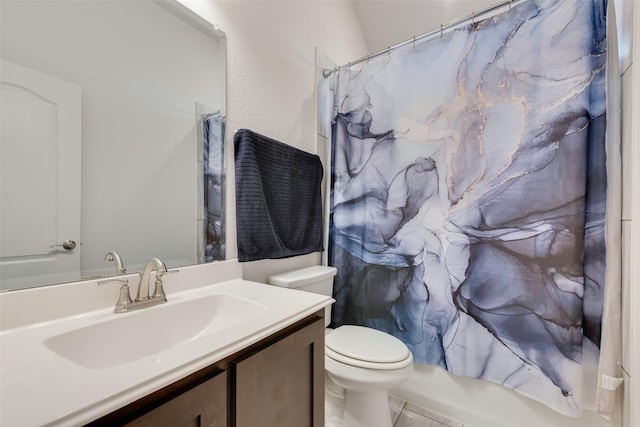 full bathroom with tile patterned flooring, shower / bath combination with curtain, vanity, and toilet