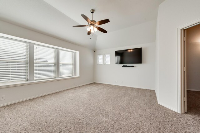 unfurnished living room featuring carpet floors, ceiling fan, and lofted ceiling