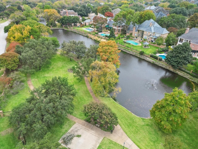 drone / aerial view with a water view