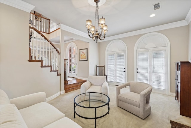 carpeted living room with ornamental molding and an inviting chandelier