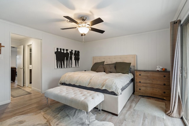 bedroom featuring crown molding, ceiling fan, and light hardwood / wood-style floors