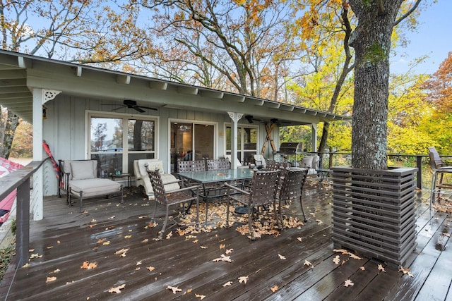 wooden terrace featuring ceiling fan