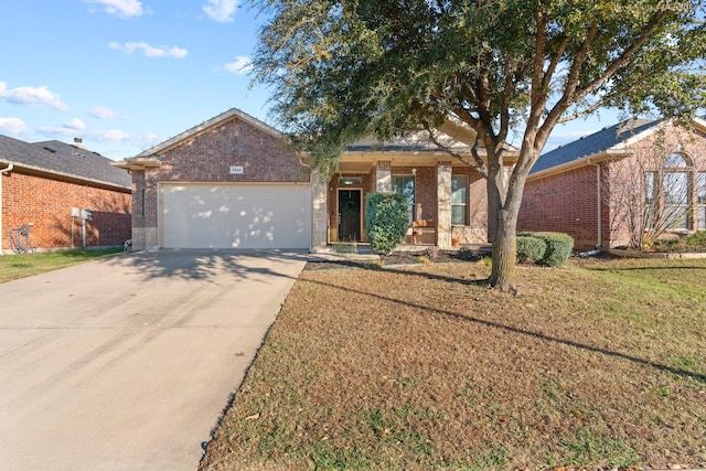 view of front facade with a garage and a front lawn