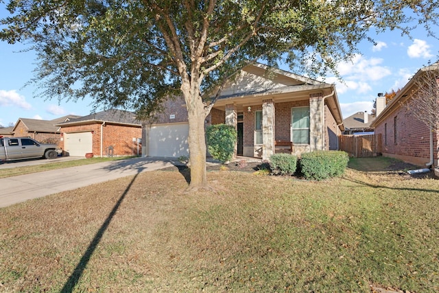 view of front facade featuring a garage and a front yard