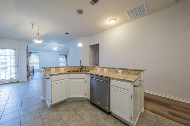 kitchen with white cabinetry, decorative light fixtures, dishwasher, and sink