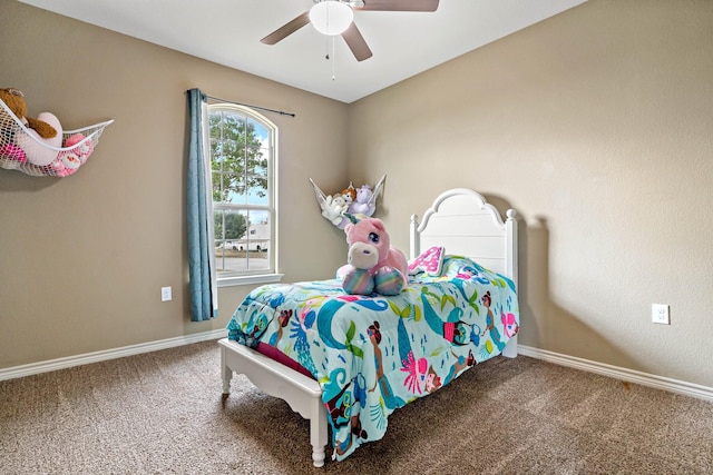 bedroom with ceiling fan and carpet