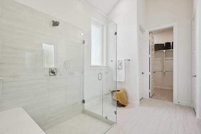 bathroom featuring an enclosed shower