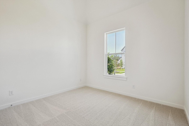 unfurnished room featuring carpet floors