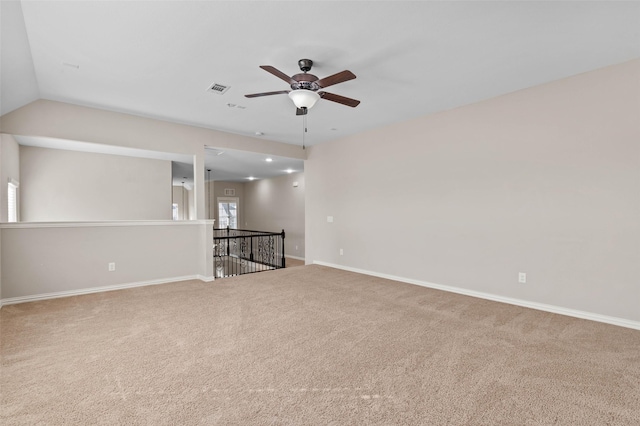 unfurnished living room featuring ceiling fan and carpet floors