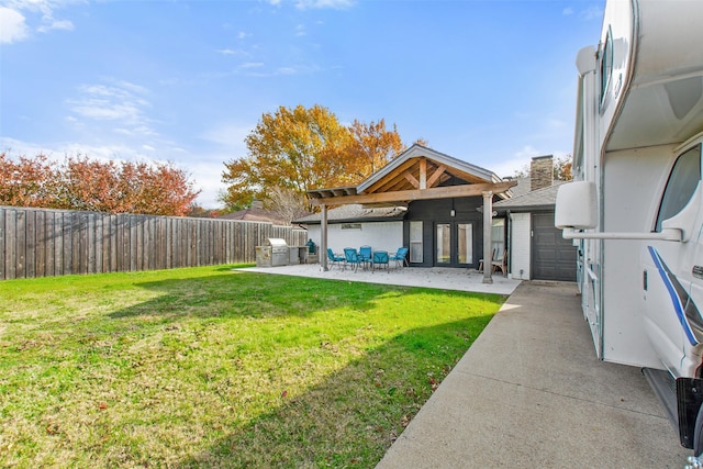 view of yard with a patio area