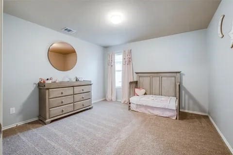 bedroom featuring carpet flooring