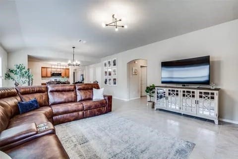 living room with a chandelier