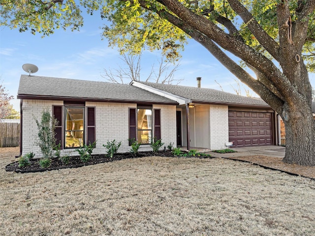 single story home featuring a garage