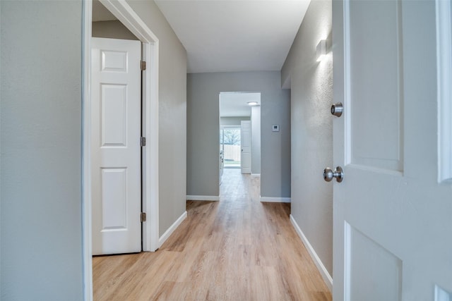 hallway featuring light hardwood / wood-style flooring