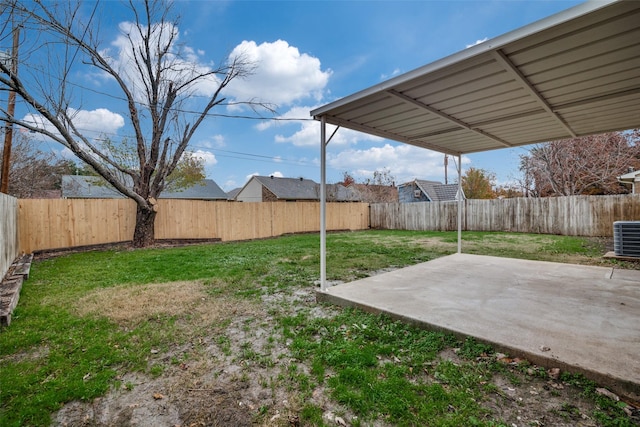 view of yard featuring a patio area and cooling unit