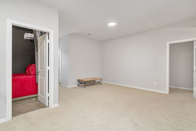 bedroom with light colored carpet