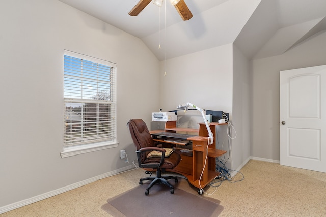 office area featuring carpet flooring, ceiling fan, and lofted ceiling