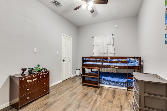 bedroom featuring ceiling fan and light wood-type flooring