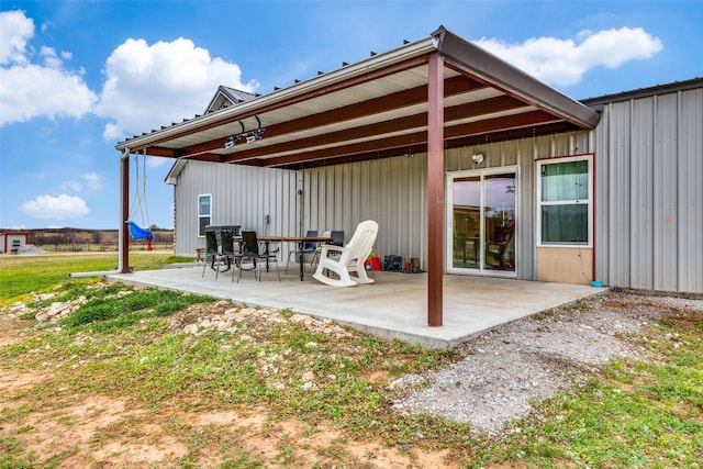 rear view of house featuring a patio area