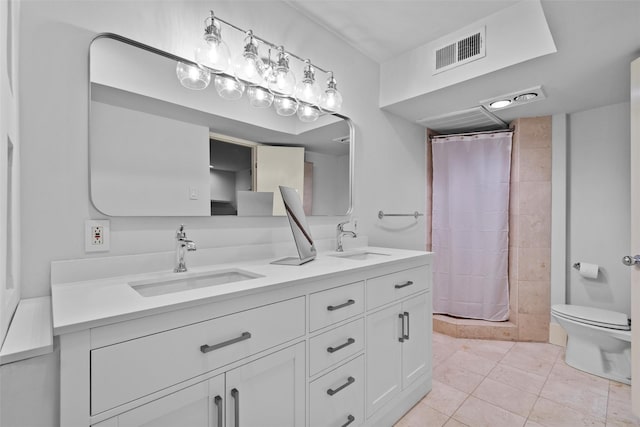 bathroom featuring tile patterned flooring, vanity, toilet, and a shower with curtain