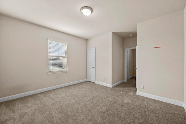 spare room with carpet flooring