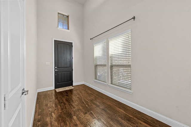 foyer featuring dark hardwood / wood-style floors