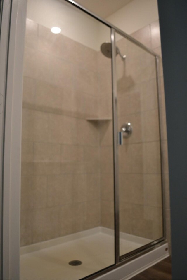 bathroom with an enclosed shower