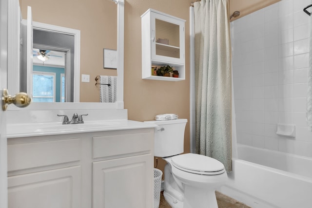 full bathroom featuring vanity, ceiling fan, toilet, and shower / tub combo