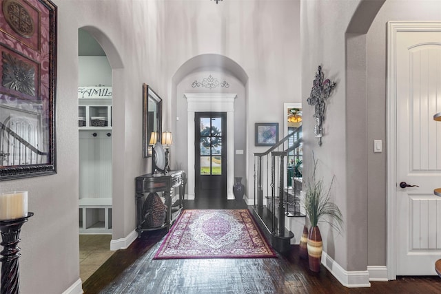 foyer entrance featuring dark hardwood / wood-style flooring