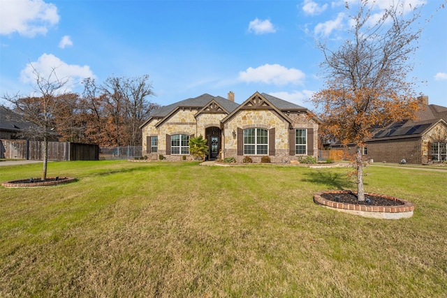 view of front of house with a front lawn