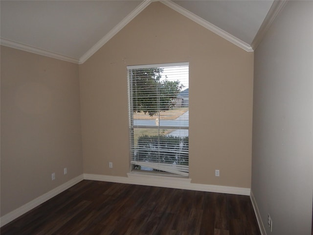 empty room featuring dark hardwood / wood-style flooring, crown molding, and vaulted ceiling