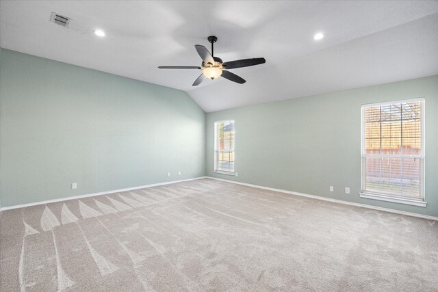 dining space with ceiling fan, dark hardwood / wood-style floors, and lofted ceiling