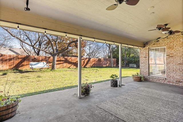 view of patio / terrace with ceiling fan and a fenced backyard