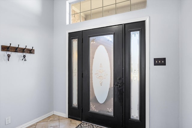 view of tiled entrance foyer